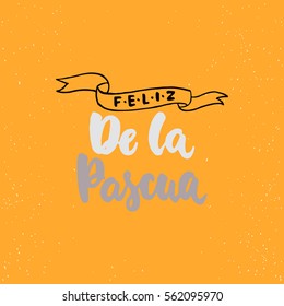 Feliz de la Pascua - lettering on spanish what means Happy Easter calligraphy phrase isolated on the background. Fun brush ink typography for photo overlays, t-shirt print, poster design