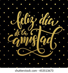 Feliz Dia de la Amistad. Friendship Day golden lettering in Spanish for friends greeting card. Hand drawn vector gold calligraphy. Polka dot glitter black background.