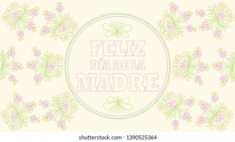 Feliz Dia de la Madre - Happy Mothers Day in Spanish language - Greeting Card. Embroidered message on a pastel yellow fabric inside a circular border with drawings of flowers embroidered in red 