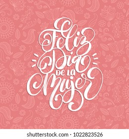 Feliz Dia De La Mujer translated from Spanish Happy  International Women's Day handwritten lettering in vector for greeting card, invitation, banner etc.Vintage calligraphy 8 March on pink background.