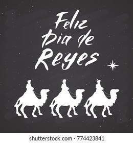 Feliz Dia de Reyes, Happy Day of kings, Calligraphic Lettering. Typographic Greetings Design. Calligraphy Lettering for Holiday Greeting. Hand Drawn Lettering Text Vector illustration on chalkboard/