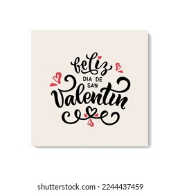 Feliz Dia De San Valentin handwritten text in Spanish meaning Happy Valentine's Day. Hand drawn lettering with hearts. Festive typography for greeting card template or poster concept. Romantic quote