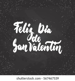 Feliz Dia de San Valentin, what means Happy Valentines Day -Spanish love lettering calligraphy phrase isolated on the background. Fun brush ink typography for photo overlays, print, poster design