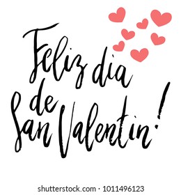 Feliz Dia dos Namorados Happy Valentines day hand written brush lettering isolated on white with small heart decoration.