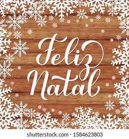 Feliz Natal calligraphy hand lettering on on wood background with snowflakes. Merry Christmas typography poster in Portuguese. Vector template for greeting card, banner, flyer, invitation, etc.