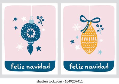 Feliz Navidad - Merry Christmas. Spanish Hand Drawn Christmas Vector Card. Cute Christmas Tree Decorations. Yellow and Blue Baubles Isolated on a Pastel Pink Background. Simple Winter Holiday Card.