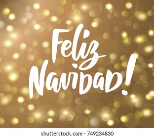 Feliz Navidad - spanish Merry Christmas hand drawn text. Golden sparkling glowing lights background. Holiday greetings quote. Great for Christmas and New year cards, party posters, gift tags.