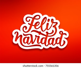 Feliz Navidad spanish Merry Christmas text on white paper label with carving over red background. Modern calligraphy lettering on sticker for season greetings. Vector background