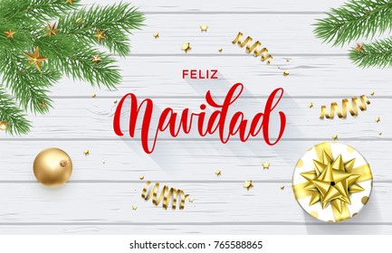 Feliz Navidad Spanish Merry Christmas golden decoration and calligraphy font on white wooden background for greeting card. Vector Christmas or New Year gold shiny star on Xmas tree for winter holiday