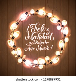 Feliz Navidad y Prospero Ano Nuevo.  Merry Christmas and Happy New Year. Spanish Glowing Christmas White Lights Wreath for Xmas Holiday Greeting Card Design. Wooden Hand Drawn Background.