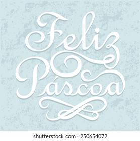 Feliz Pascoa is Happy Easter in portuguese. Calligraphic text on grunge background.