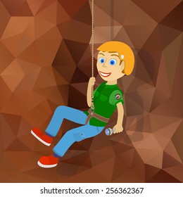 fellow climber descends on a rope from a cliff.
