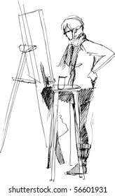  a fellow drawing on an easel