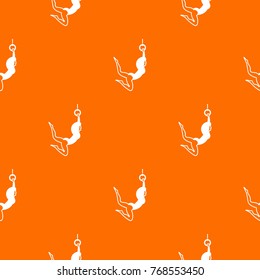 Female aerialist pattern repeat seamless in orange color for any design. Vector geometric illustration