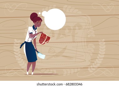 Female African American Chef Cook Holding Meat Cartoon Chief In Restaurant Uniform Over Wooden Textured Background Flat Vector Illustration