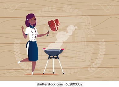 Female African American Chef Cook Grilling Meat Cartoon Chief In Restaurant Uniform Over Wooden Textured Background Flat Vector Illustration