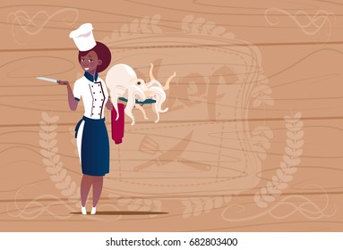 Female African American Chef Cook Holding Octopus Cartoon Chief In Restaurant Uniform Over Wooden Textured Background Flat Vector Illustration