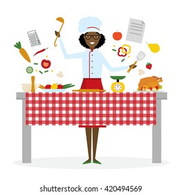 Female african american chef cooking on pink background. 