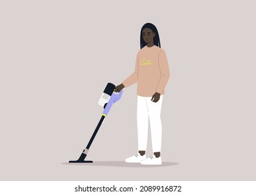 A female African character cleaning with a cordless vacuum cleaner, household chores