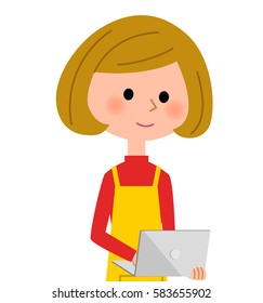 The female of the apron with a laptop computer