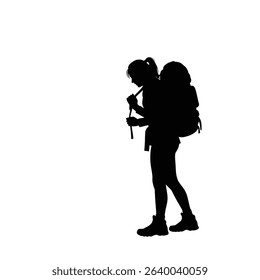 Female backpacker adjusting gear silhouette.