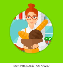 A female baker holding basket with bakery products. Baker standing in front of bakery. Baker with bowl full of bread. Vector flat design illustration in the circle isolated on background.