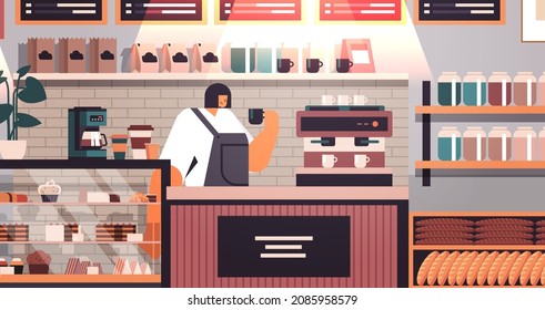 female barista drinking coffee waitress standing at cafe counter modern cafeteria interior horizontal