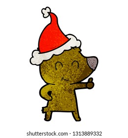 female bear hand drawn textured cartoon of a wearing santa hat