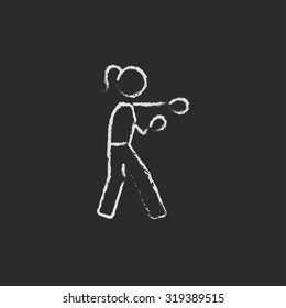 Female boxer hand drawn in chalk on a blackboard vector white icon isolated on a black background.