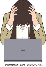 Female businesswoman holding her head in front of a computer