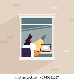 Female cartoon character in window. Facade of a brick house with a window. A young, beautiful woman freelancer works at home at the laptop. Vector illustration in flat design, square format.