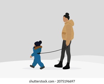 Female character and child with baby reins walking in winter