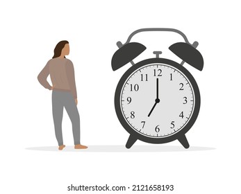 Female character in home clothes looks at a huge alarm clock on a white background