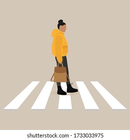 A female character in a jacket and with a backpack goes on a crosswalk
