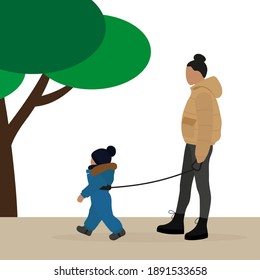 Female Character Leads A Child On A Special Baby Leash Outdoors Near A Tree