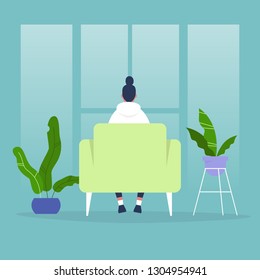 Female character sitting in a chair in front of the window. Back view. Interior concept. Flat editable vector illustration, clip art