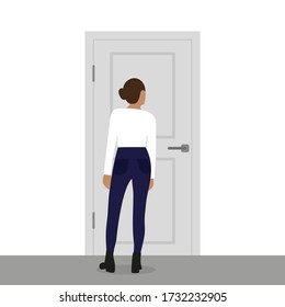 Female character stands and looks at the closed door