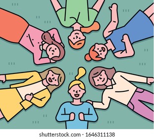 Female characters lay in a circle on the grass ground. flat design style minimal vector illustration.