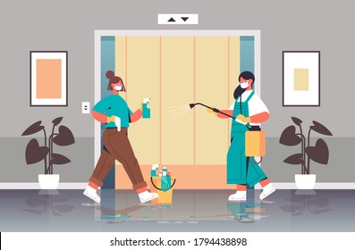 female cleaners in masks disinfecting coronavirus cells in elevator to prevent covid-19 pandemic cleaning service disinfection control of epidemic concept horizontal full length vector illustration