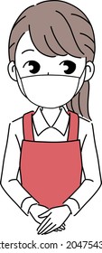 A female clerk wearing a mask and working at a supermarket