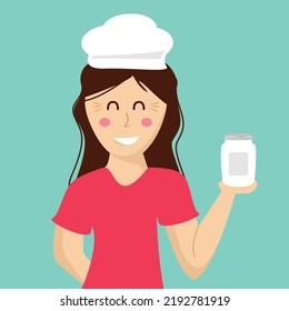 Female Cook Holding a Mason Jar