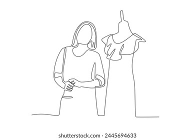 Diseñadora femenina con su ropa. Dibujo de una línea Pequeño de negocios