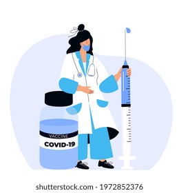 Female doctor holds huge syringe with coronavirus vaccine COVID-19. Vaccination campaign. Time to vaccinate.