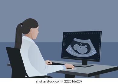 A female doctor looks at the result of an ultrasound scan. Medical diagnosis of a child in the womb, pregnancy and health, the procedure for examining the embryo, placenta, umbilical cord