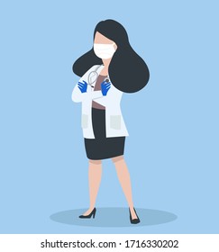 Female doctor  poses on blue background