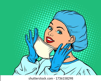 female doctor putting on a medical mask. Pop art retro vector illustration vitch vintage 50s 60s style