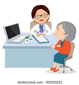 Female doctor with senior woman. Medical Consultation between doctor and her patient at desk.