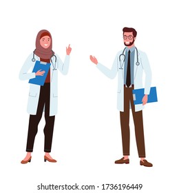 a female doctor wearing a hijab stood next to a male doctor.