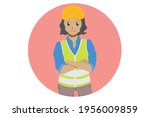 Female engineer with wearing safety helmet and reflecting vest
