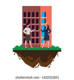 female engineers builders workers with building